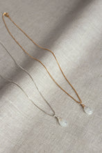 Load image into Gallery viewer, Two teardrop-shaped rainbow moonstone necklaces with a vibrant iridescent flash, hand wire-wrapped and hanging from a box chain with a spring-ring clasp., one silver and gold chain.

